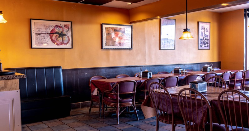 Tables and chairs, ready for a diner