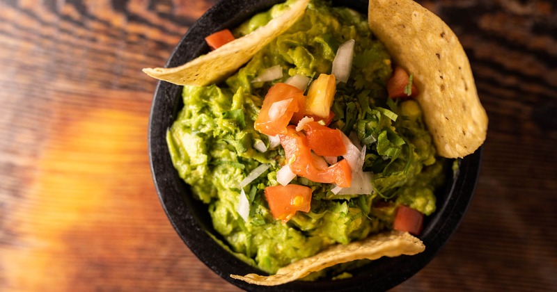 Side of Guacamole with chips, top view