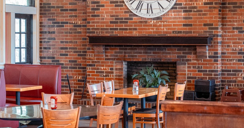 Interior, tables and chairs in dining area
