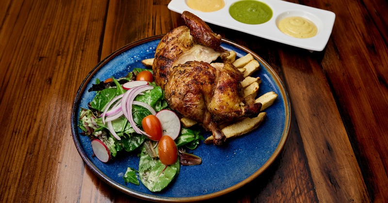 Half of roasted chicken pollo