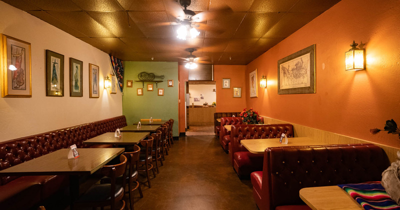 Interior, booth and chairs seating areas left and right