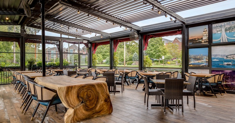Spacious patio with large wooden table