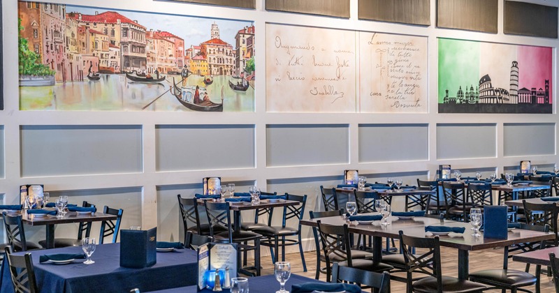 Interior, tables with chairs near the wall