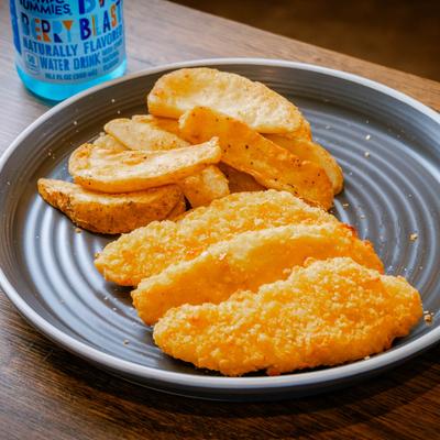 Kids meal, chicken fingers served with potato wedge.