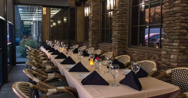 A long dining table set for guests