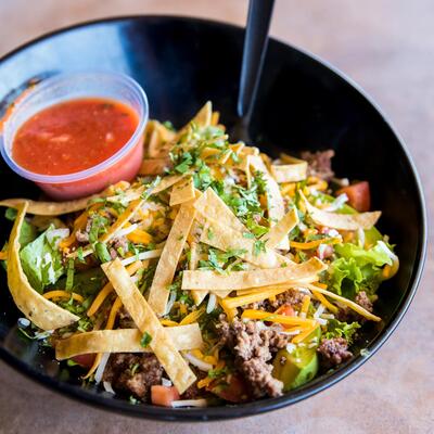 Taco Salad with Ground Beef, chips and housemade salsa