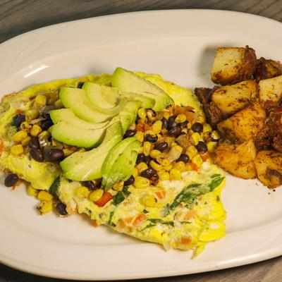 California omelette with home roasted sweet potatoes on the side