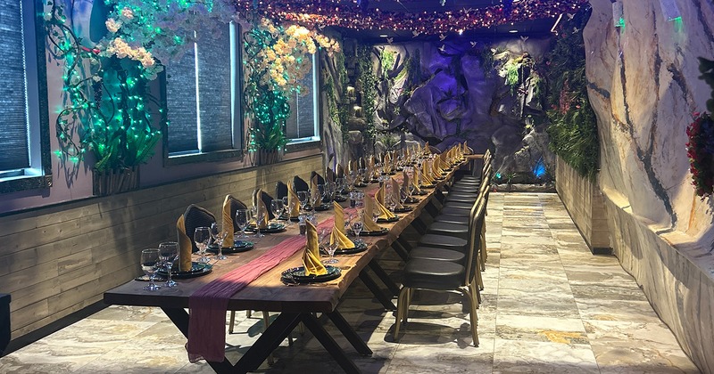 Private parties room with a vast and elegant set table ready for guests