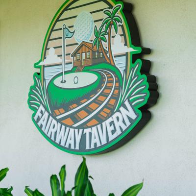 Fairway Tavern sign mounted on an exterior wall.