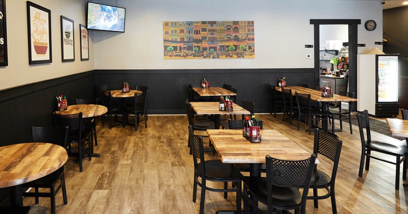 Interior, seating area with tables and chairs