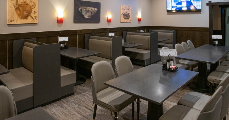 Interior, dining area, seating booths with tables, regular tables for four and six
