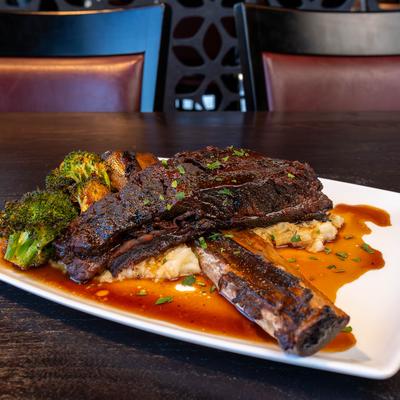 Braised Short Rib, Smashed potatoes, roasted broccoli, demi glace.