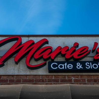 Marie's Cafe and Slots exterior sign.
