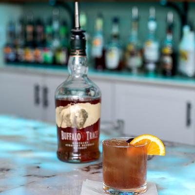 Cocktail and a bottle of Buffalo Trace Bourbon.