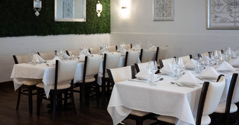 Long dining tables ready for guests