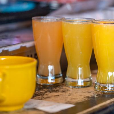 Assorted beverages on a bar counter.