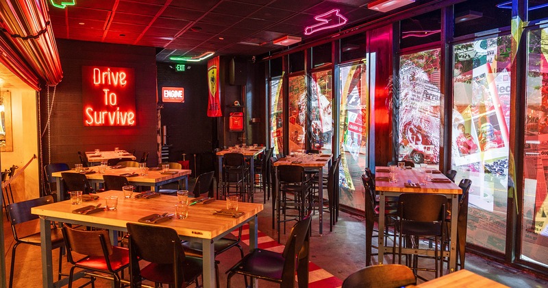 Interior space, modern design of the restaurant's dining area with set dining tables