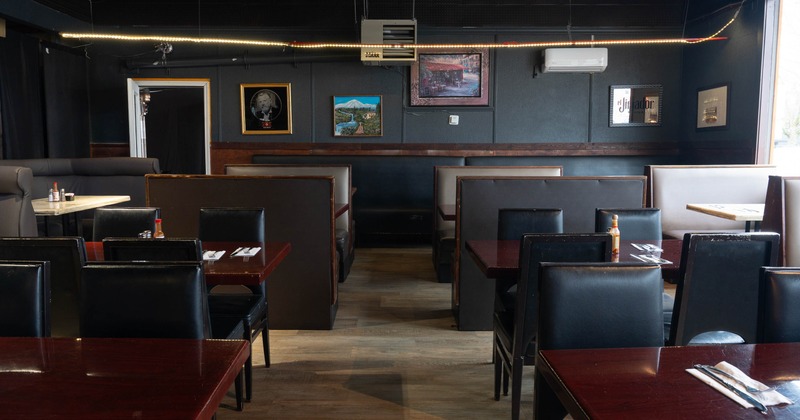 Interior, dining area with pictures on the wall