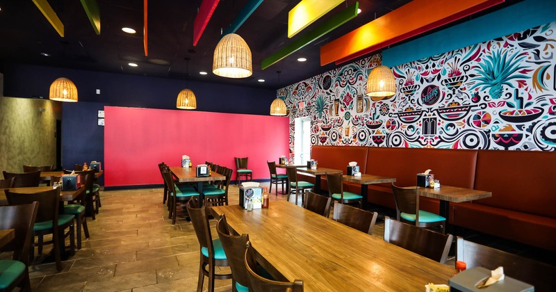 Interior, wooden tables in seating area