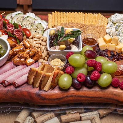 Board with cheese, charcuterie and fruit