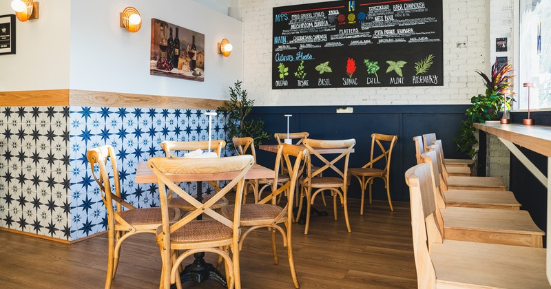 Cozy interior dining area with tables ready for guests