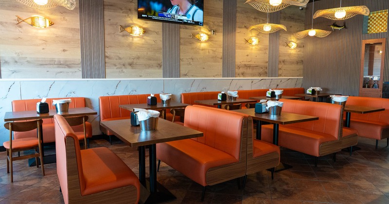 Interior, main seating with TV on the wall