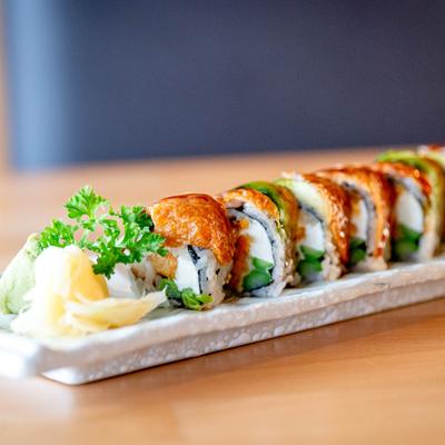 Veggie Dragon Maki topped with tofu skin, avocado and sweet soy sauce.