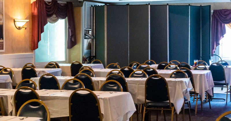 Tables ready for guests at the seating area