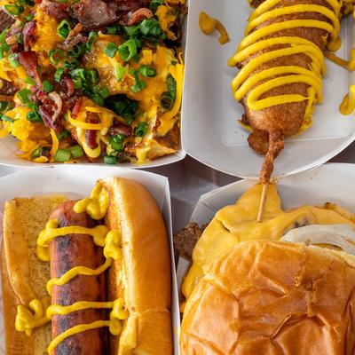 Different types of food displayed on table, top view.