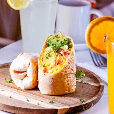 Breakfast wrap with eggs and avocado.