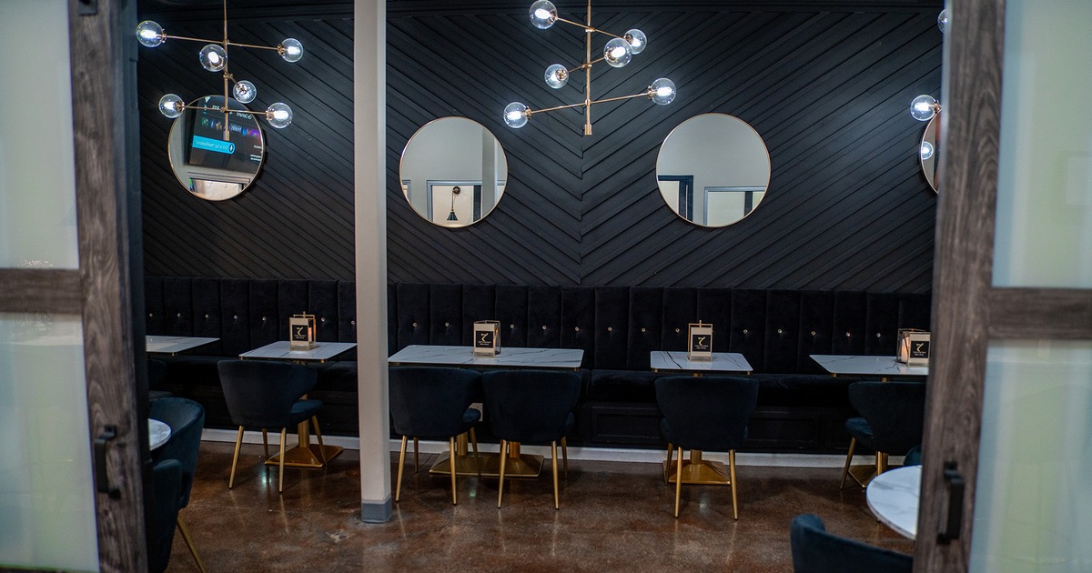 Interior, private parties room, tables lined up and seats