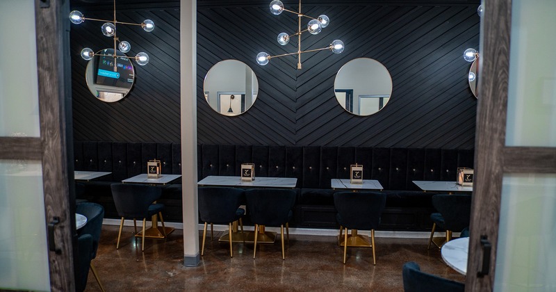 Interior, private parties room, tables lined up and seats