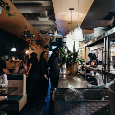 Servers attending to customers.