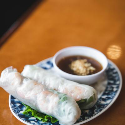 Soft spring rolls served with a peanut sauce for dipping.