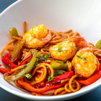 Stir fried shrimp, with veggies, and steamed rice noodles.