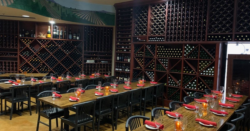 Wine room with set tables for dining