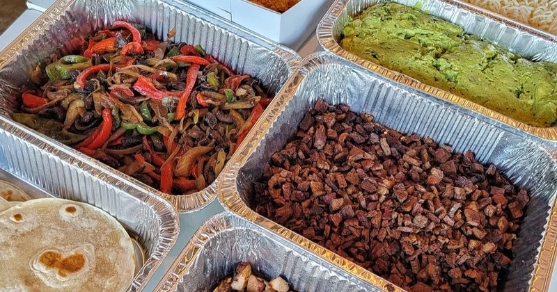 Catered fajita feast in aluminum trays