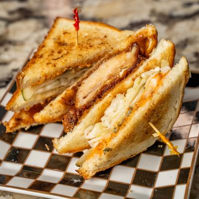 Katsu Sando sandwich with crispy breaded chicken thigh.