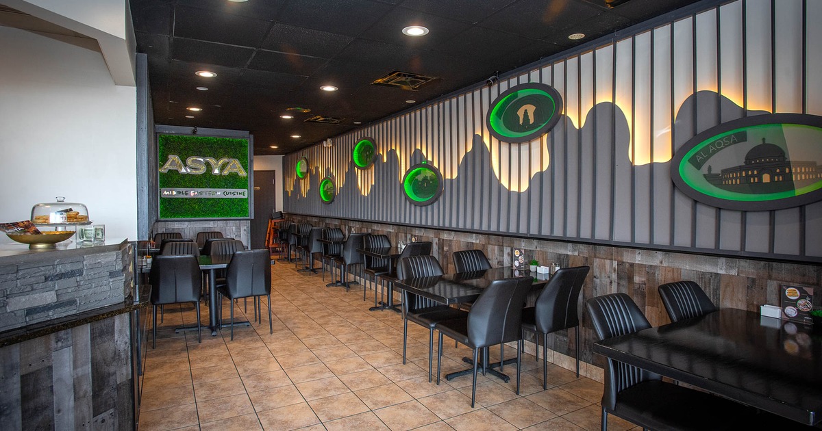 Interior, dining area, tables and chairs for two and four, tile flooring