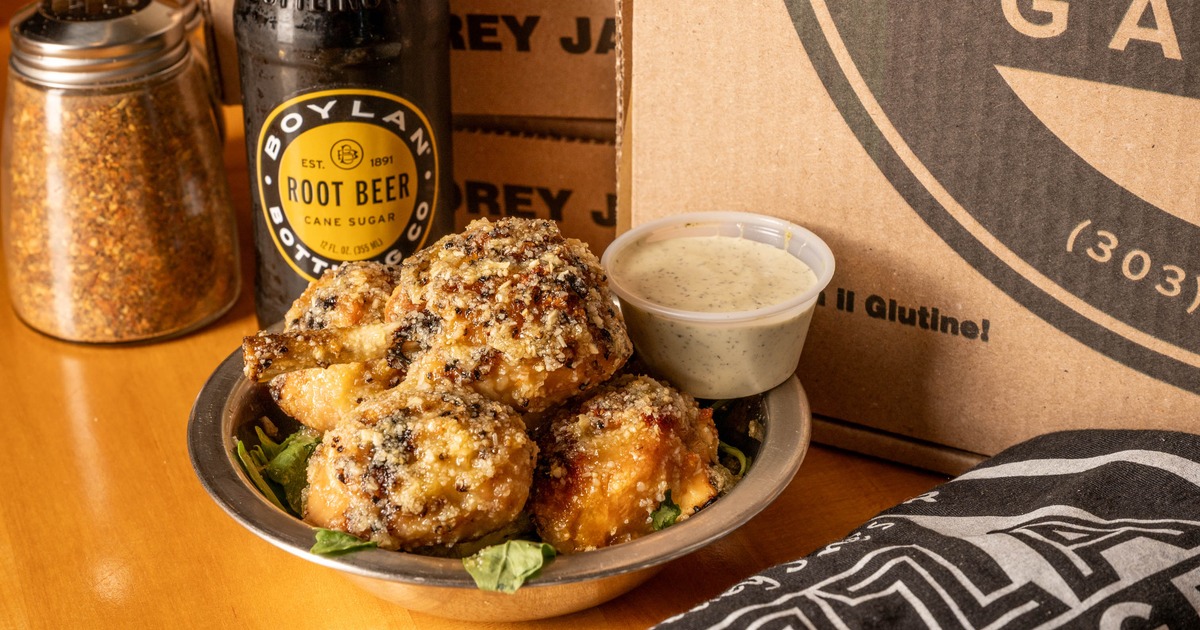 Garlic Parmesan wings served with dipping sauce
