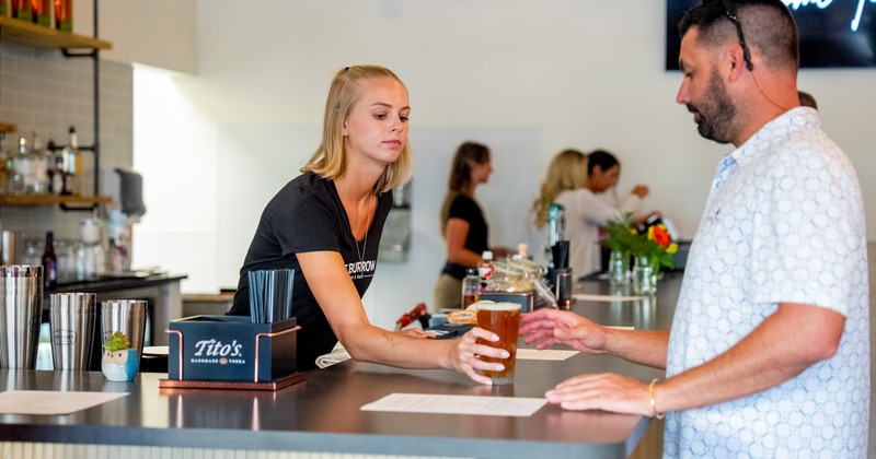 Drink counter, stuff serving, guests