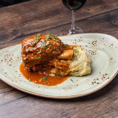 Pork shank with mashed potatoes and gravy