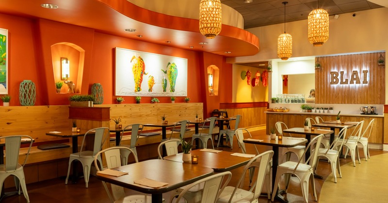 Inside, seating area with tables and chairs