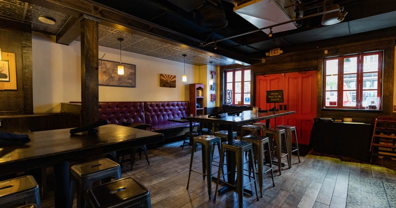 Interior, bar tables and stools in dining area