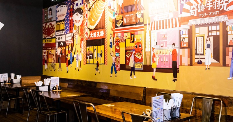 Dining tables, long wall bench seating with chairs