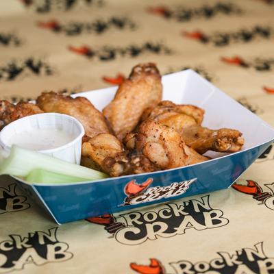 Chicken wings with dip.