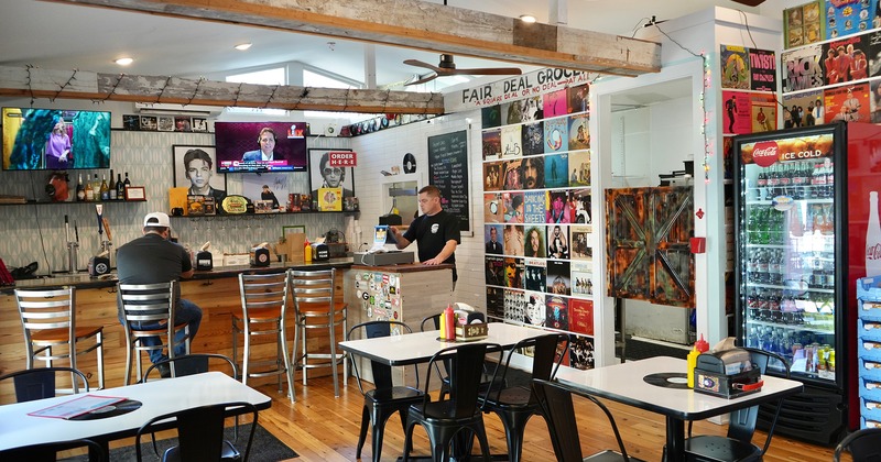 The dining area and bar area decorated with old album covers