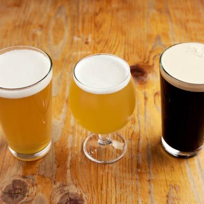 Three different glasses of craft beer.