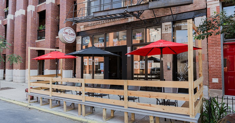 Exterior, sidewalk garden, parasols