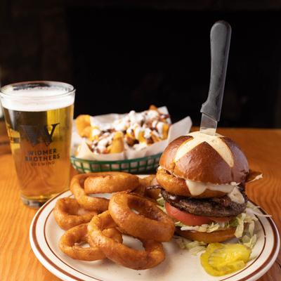 Bacon cheeseburger, onion rings, and beer.